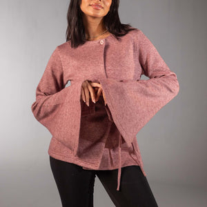 توب لف محاك ناعم بلون الروز مع أكمام واسعة