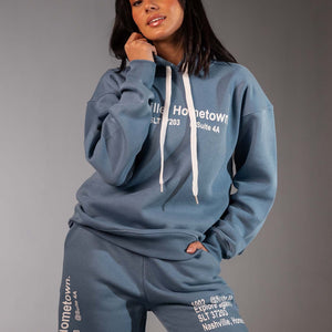 هودي أزرق بطبعة جرافيك ناشفيل