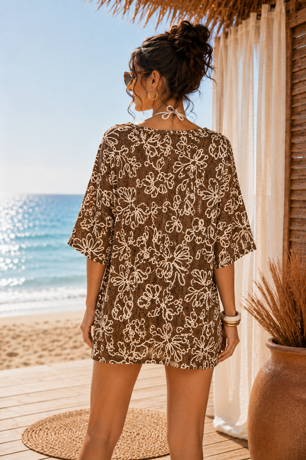 Oversized embroidered beach tee with a relaxed fit and soft summer feel